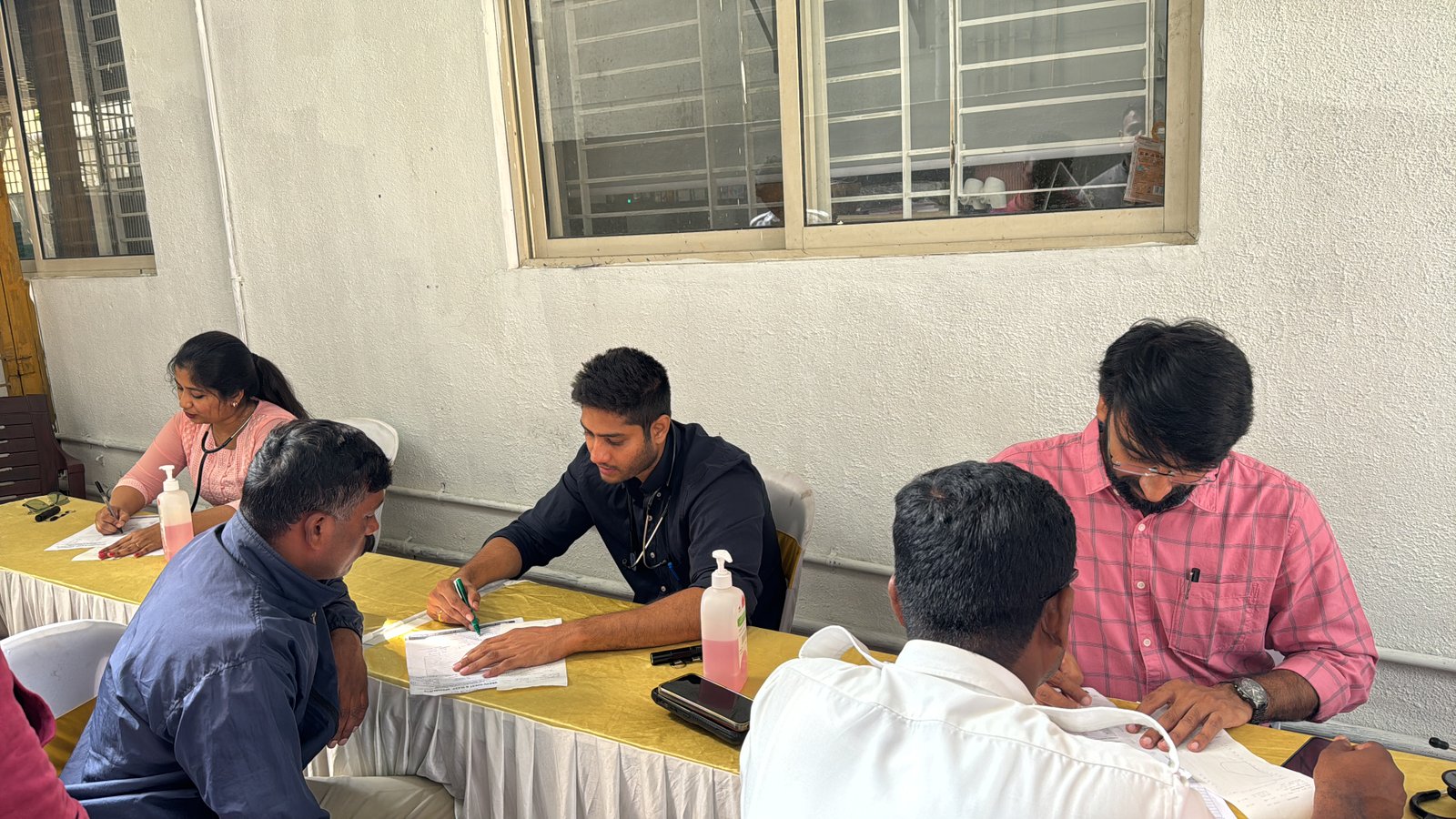 Workers registering for free respiratory screening at a VORIC camp in Bengaluru