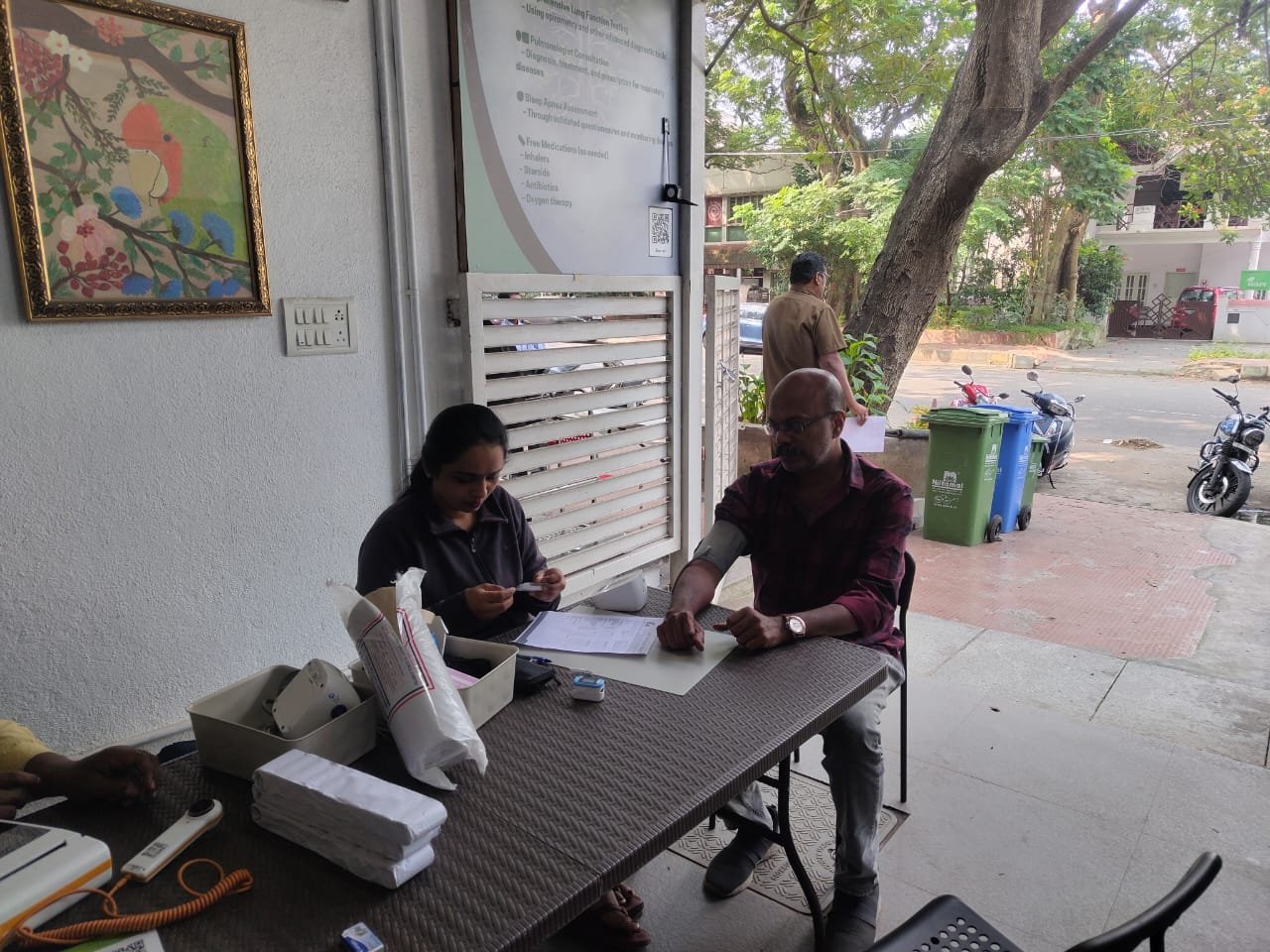 Blood pressure and oxygen saturation being checked at a VORIC occupational health screening camp